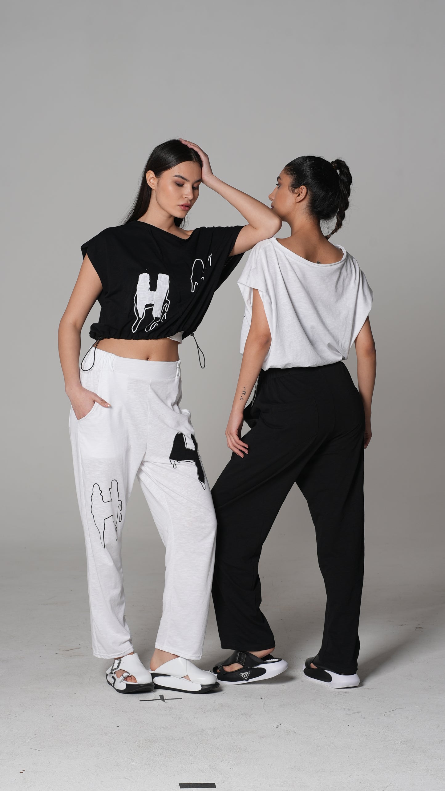Slogan-Print Trousers — H4 London SS26